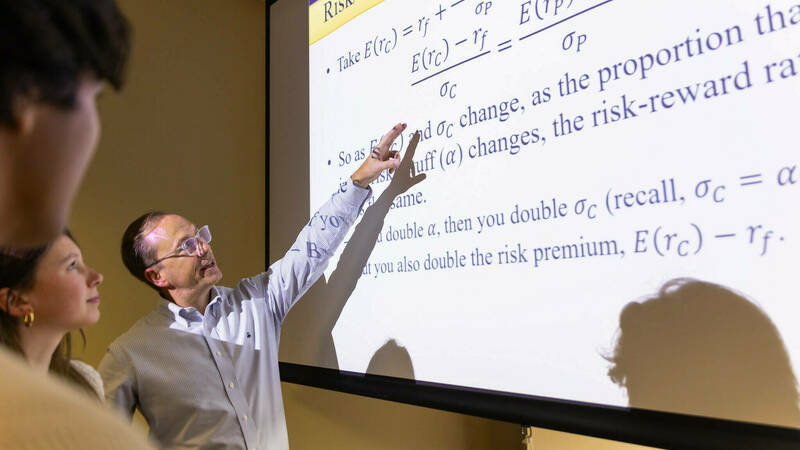 Professor and Associate Dean for the Social Sciences and Research Michael Pries instructs students.
